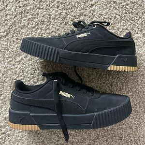 Puma Women’s Black Sneakers with Gold Details